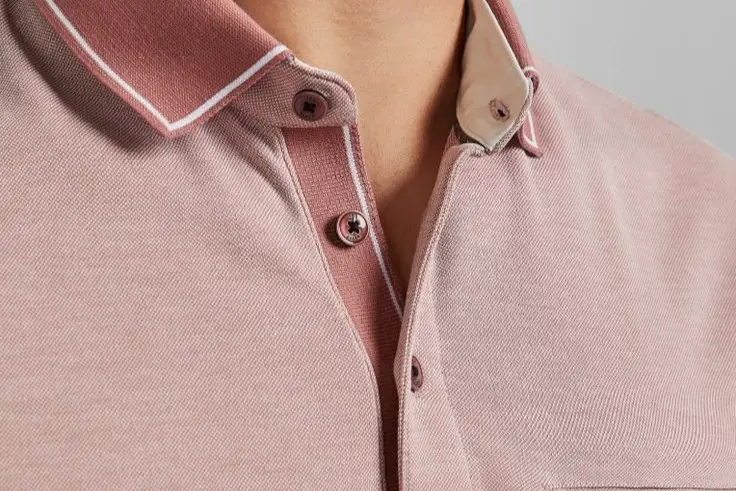 Shown button of a polo t-shirt.