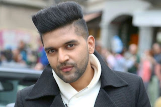 Guru Randhawa in medium length top flat haircut.