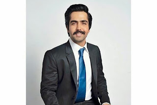 Hardy sandhu in business cut hairstyle and thick moustache