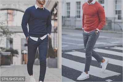 Two mens are walink on the road wearing a crew neck sweater.