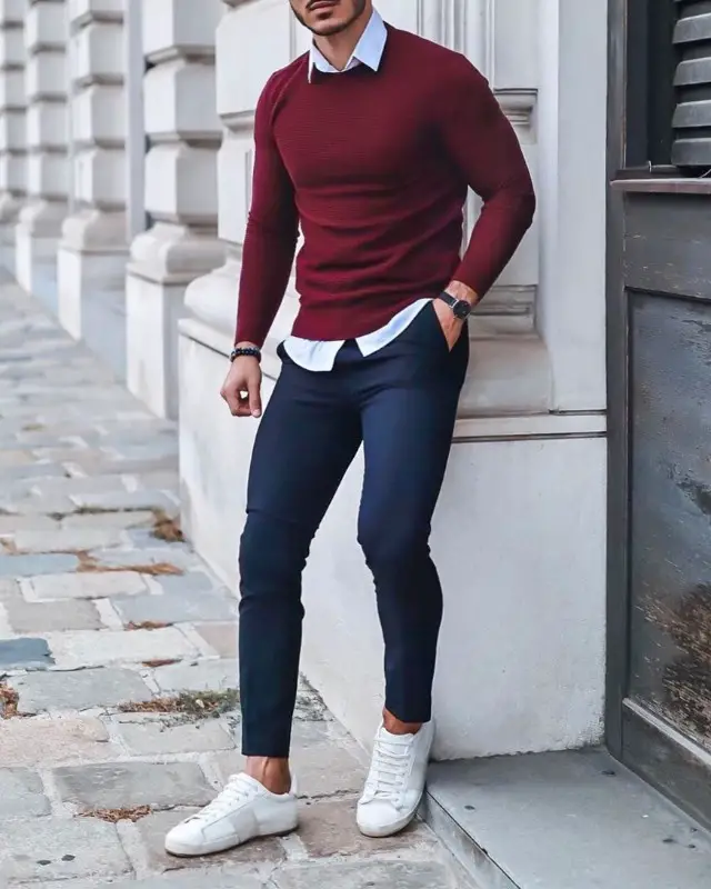 Maroon sweater with blue trousers, men.