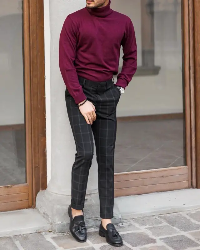 Wine color highneck and black trousers.