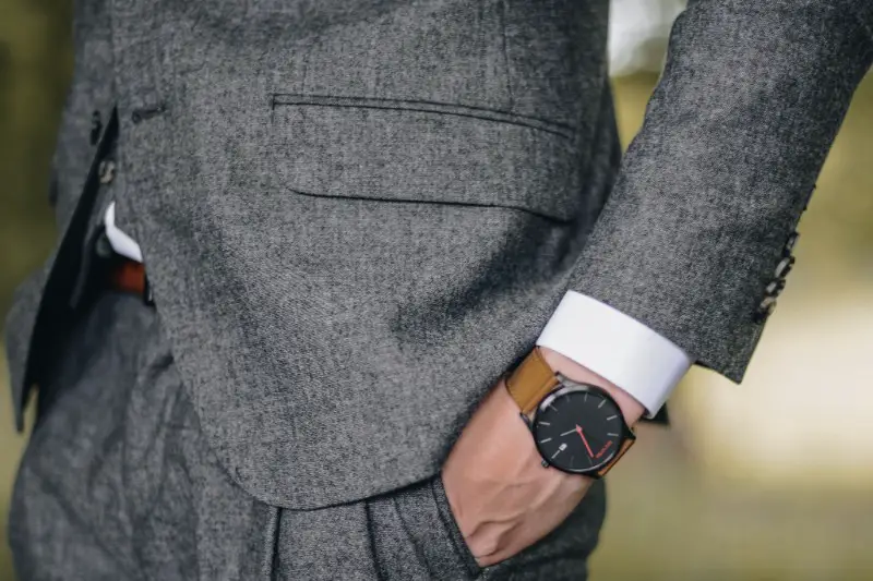 men in grey suit and watch.