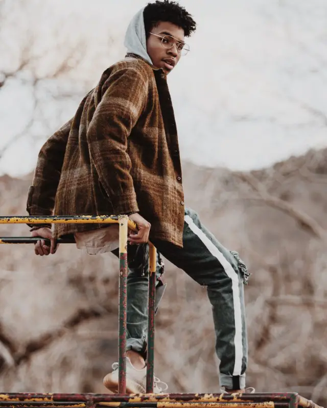 Man wearing, Coat over hoodie and stretchable joggers