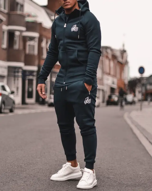 A man wearing Athleisure track suit.