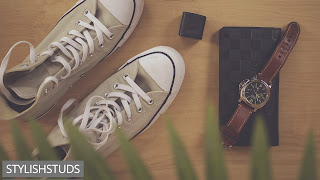 Image of shoes along with purse watches and other accessories.