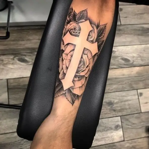 Side forearms cross tattoos