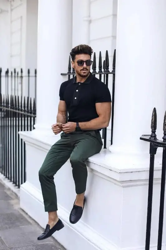 Black shirt with olive green pants