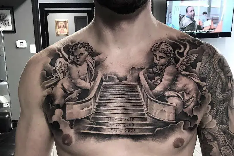 Heaven stairs Chest Tattoo Ideas Men.