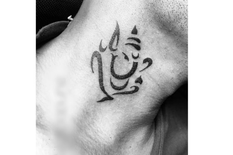Lord Ganesha Neck tattoos.