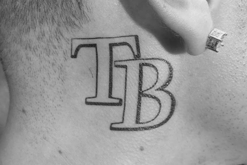 Written text (quotes, words and alphabet) Neck tattoos