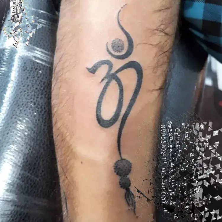 Om tattoo on hands