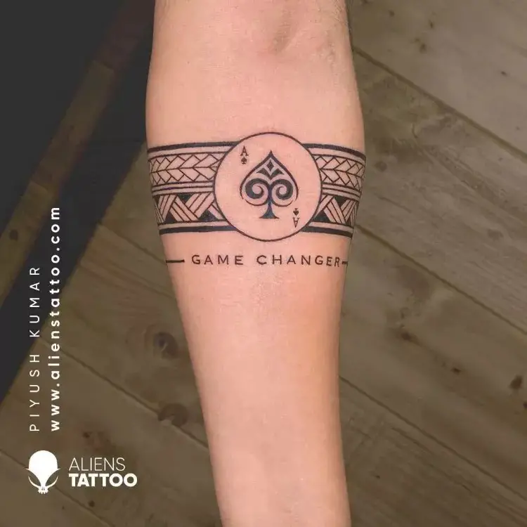 Game changer, arm band tattoos.
