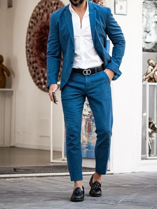 Cobalt blue colour suit with white shirt.
