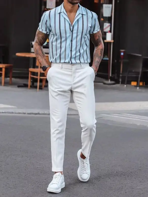 Stipes design half sleeves shirts with white trousers.