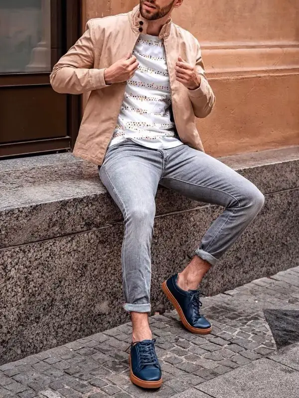 Beige colour jacket and grey jeans, men's outfit.