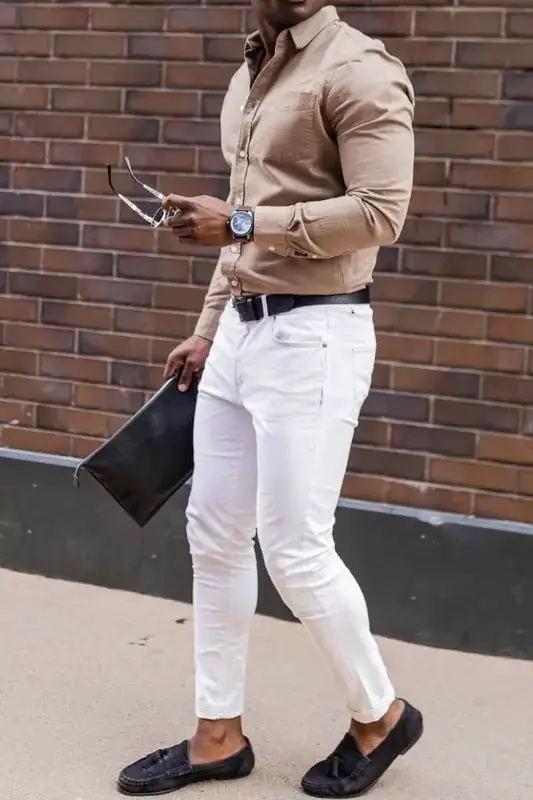 Beige colour shirt and white jeans, men's outfit.