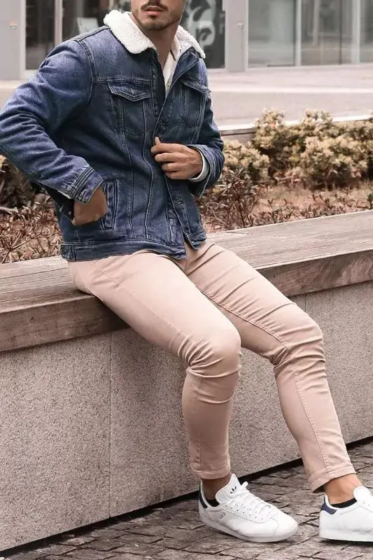 Blue denim and beige jeans, men's outfit.