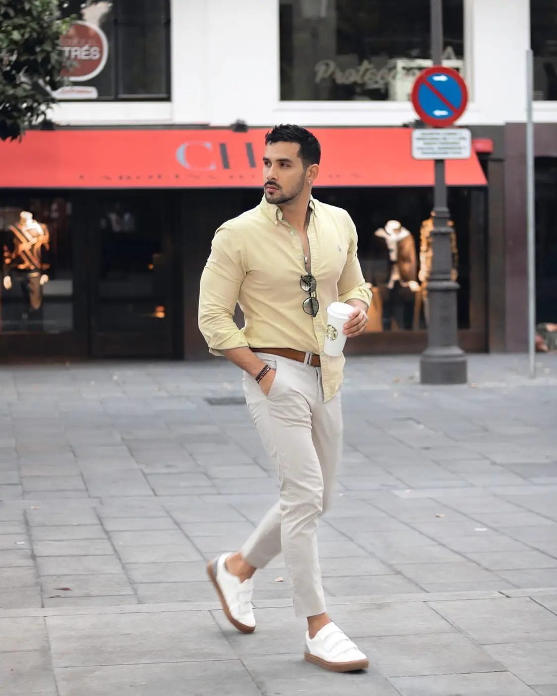 yellow shirt with grey pants