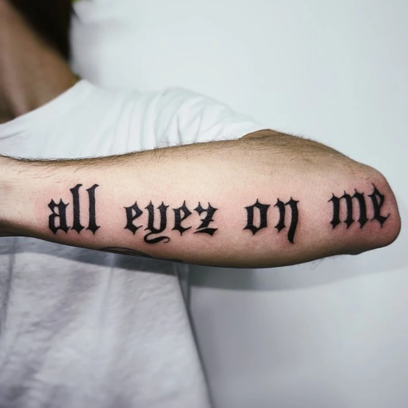 Text tattoo on hand men - all eyes on me