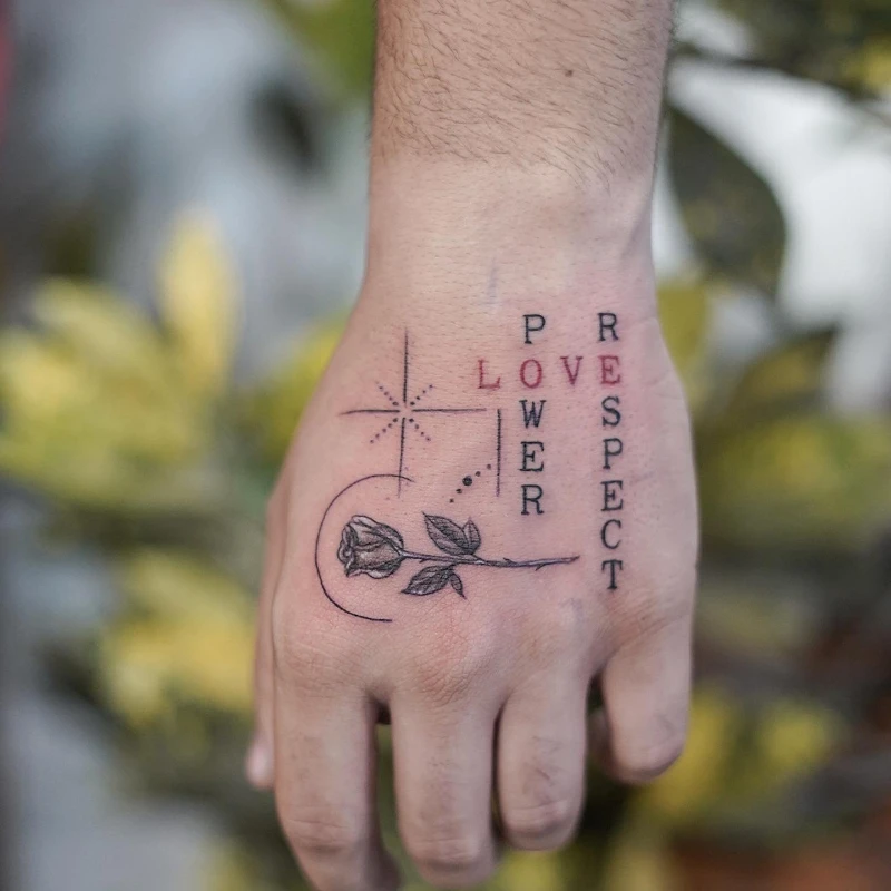 Text tattoo upper palm - power love respect